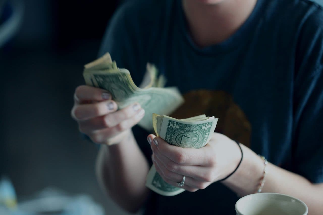 Hands counting cash