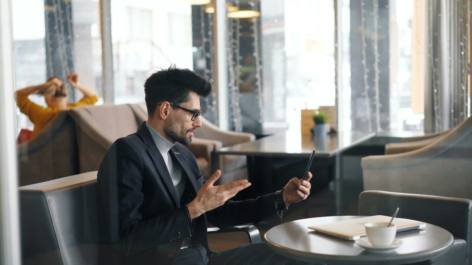 Retail manager reviewing operations on a tablet