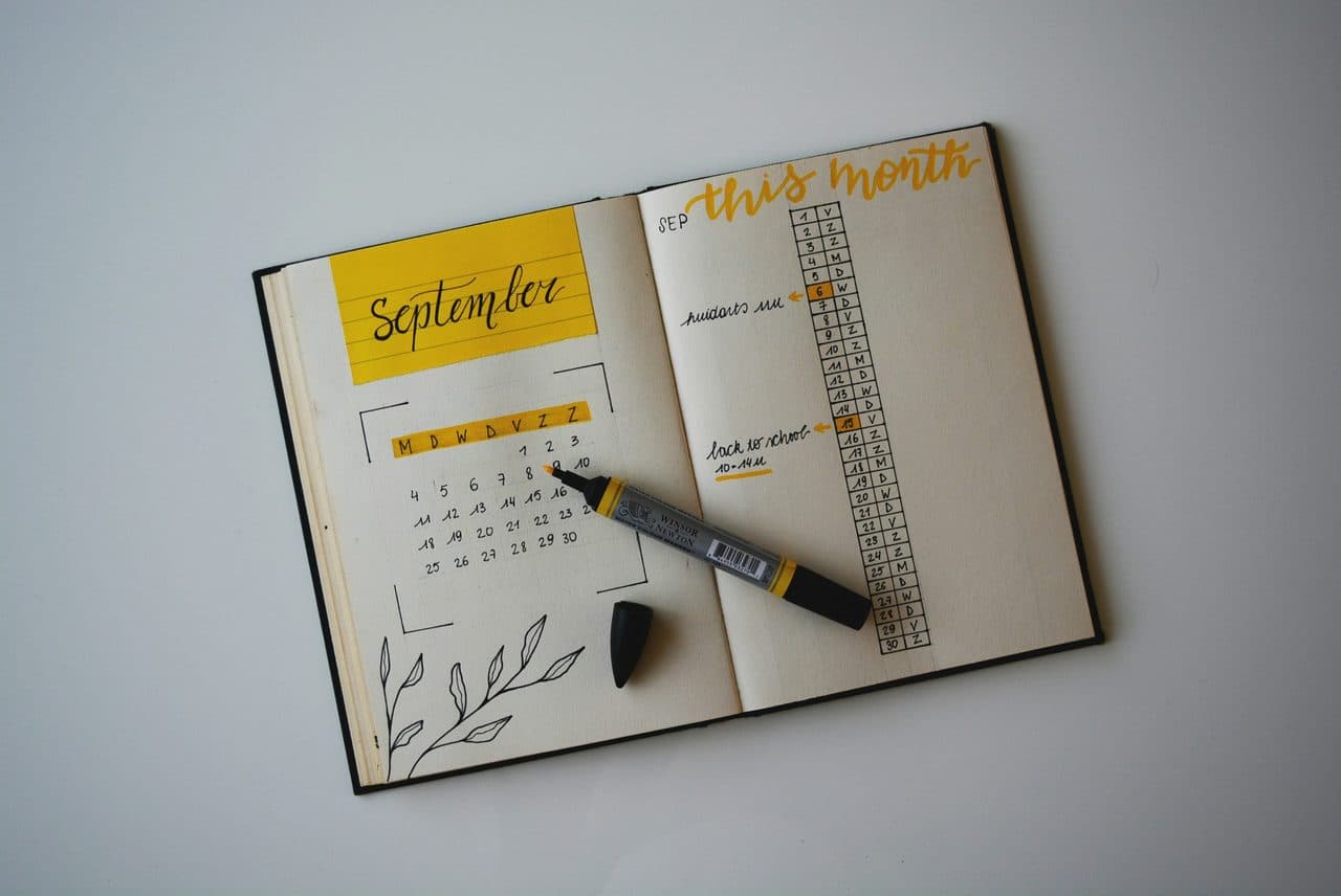 Open planner showing weekly schedule